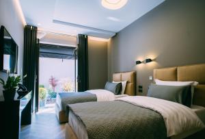 Postel nebo postele na pokoji v ubytování Hotel Stela Center