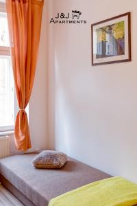 J&J Apartments Łazienna 30 - 10客房内的一张或多张床位