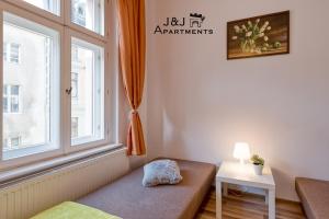 J&J Apartments Łazienna 30 - 10客房内的一张或多张床位