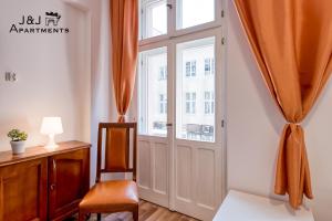 J&J Apartments Łazienna 30 - 10客房内的一张或多张床位