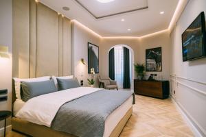 Postel nebo postele na pokoji v ubytování Hotel Stela Center