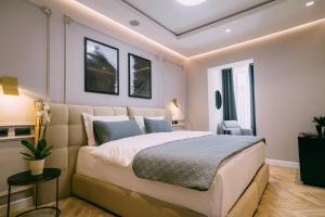 Postel nebo postele na pokoji v ubytování Hotel Stela Center