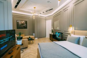 TV a/nebo společenská místnost v ubytování Hotel Stela Center