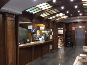 TV a/nebo společenská místnost v ubytování Hotel Cordón