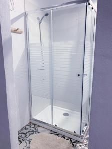 a shower stall with a glass door in a bathroom at La SELVITA in Bajamar +161 photos