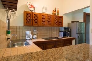 Kuchyň nebo kuchyňský kout v ubytování Club del Mar Oceanfront