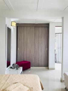 Ένα ή περισσότερα κρεβάτια σε δωμάτιο στο Maria Nancy +2 φωτογραφίες