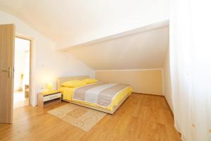 Posteľ alebo postele v izbe v ubytovaní Borik Apartment Pedic