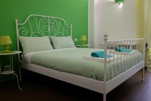 Posteľ alebo postele v izbe v ubytovaní Buonocore Rooms + 37 fotografií