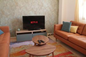 Telewizja i/lub zestaw kina domowego w obiekcie Plaza del Charco - Puerto Viejo