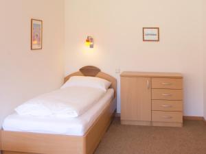 Postel nebo postele na pokoji v ubytování Haus Karoline