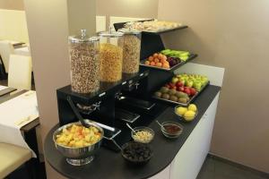 a display of different types of fruits and vegetables at Hotel Margherita in Monterosso al Mare