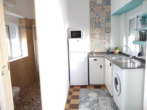 Kuchyň nebo kuchyňský kout v ubytování Conil Homes III Apartments