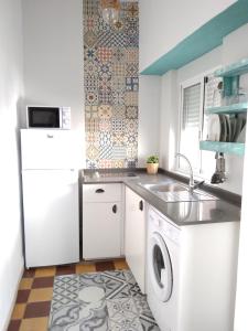 Kuchyň nebo kuchyňský kout v ubytování Conil Homes III Apartments