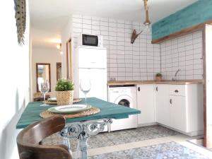 Kuchyňa alebo kuchynka v ubytovaní Conil Homes III Apartments + 23 fotografií