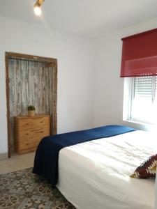 Postel nebo postele na pokoji v ubytování Conil Homes III Apartments