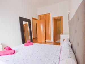 Łóżko lub łóżka w pokoju w obiekcie Vut concepcion jeronima 7