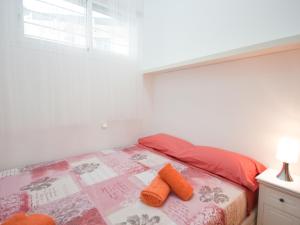 Łóżko lub łóżka w pokoju w obiekcie Vut concepcion jeronima 7