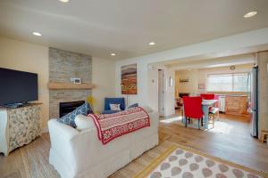 a living room with a couch and a fireplace at Park City Paradise in Park City