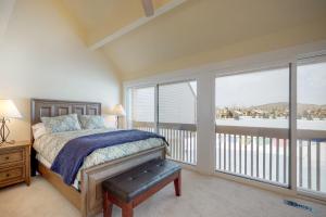 a bedroom with a bed and a large window at Park City Paradise in Park City