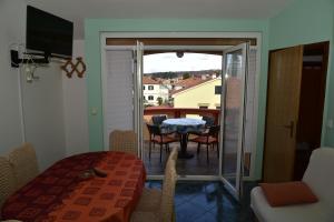 Et tv og/eller underholdning på Apartments Ivka