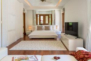 Кровать или кровати в номере Villa Macaque and Villa Languor