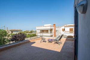 Ein Balkon oder eine Terrasse in der Unterkunft MOSAIC