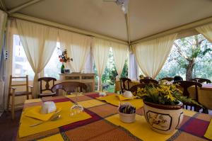 Nápoje v ubytovaní Bio Agriturismo Il Melograno di Banditella Ristorante