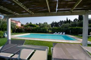 Bazén v ubytovaní Bio Agriturismo Il Melograno di Banditella Ristorante alebo v jeho blízkosti