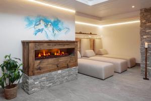 Una cama o camas en una habitación de Hotel Antika