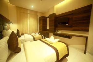 Hotel Le Grande客房内的一张或多张床位