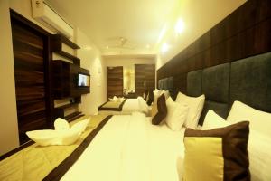 Hotel Le Grande客房内的一张或多张床位