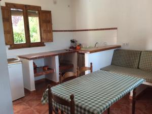 A kitchen or kitchenette at Cabañas Buenache