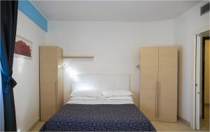 Postel nebo postele na pokoji v ubytování Residence Mareamare