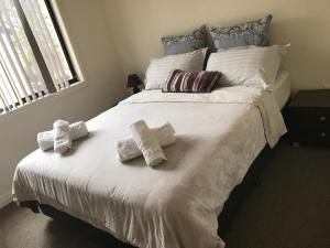 מיטה או מיטות בחדר ב-Lake Vista