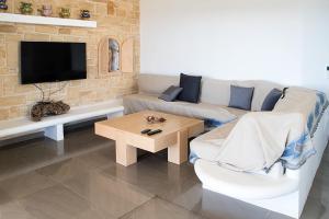 Χώρος καθιστικού στο EVILIA LUXURY VILLA