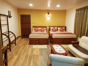 Postel nebo postele na pokoji v ubytování Mahoteak Home Stay