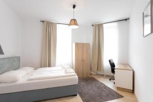 Postel nebo postele na pokoji v ubytování Apartment house in Vienna
