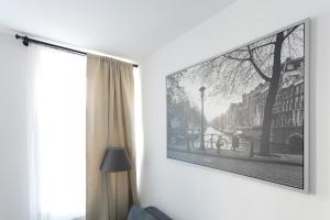 a room with a painting on the wall at Apartment house in Vienna in Vienna