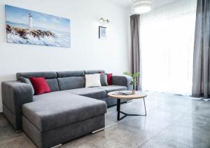 Posedenie v ubytovaní Home Away from home with outdoor pool, botanical garden and a beautiful sea view