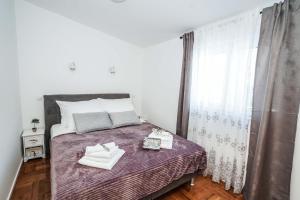 Posteľ alebo postele v izbe v ubytovaní Home Away from home with outdoor pool, botanical garden and a beautiful sea view