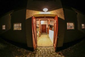 an open door to a room in a building at The Lodge in Borre