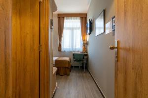 Posteľ alebo postele v izbe v ubytovaní Hotel Resurs