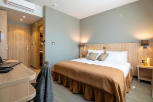 Posteľ alebo postele v izbe v ubytovaní Hotel Resurs