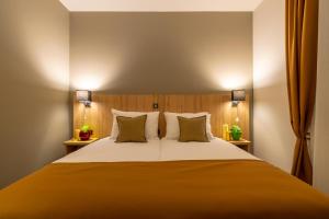 Posteľ alebo postele v izbe v ubytovaní Hotel Resurs