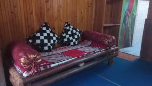 Postel nebo postele na pokoji v ubytování Vamoose Sinkawli Homestay
