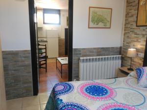 Posteľ alebo postele v izbe v ubytovaní ESTUDIO FAMILIAR En EZCARAY