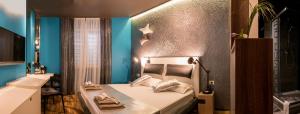 Postel nebo postele na pokoji v ubytování Design B&B Bacvice Arti