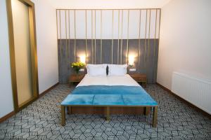Posteľ alebo postele v izbe v ubytovaní Platinum Residence Boutique