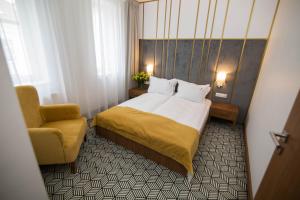 Posteľ alebo postele v izbe v ubytovaní Platinum Residence Boutique